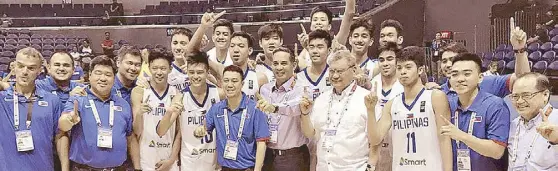  ??  ?? Officials and members of the Batang Gilas led by SBP president Al Panlilio, and SBP executive director Sonny Barrios celebrate the Filipino cagers gold medal finish in the SEABA Under-16 tournament, beating Malaysia, 83-62 at the Smart Araneta Coliseum.