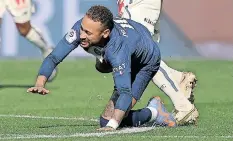  ?? | FRANCK FIFE ?? PARIS Saint-Germain’s Brazilian forward, Neymar hits the deck, injured after making contact with Lille’s French midfielder Benjamin Andre during their French L1 clash at Parc des Princes stadium in Paris on February 19. AFP