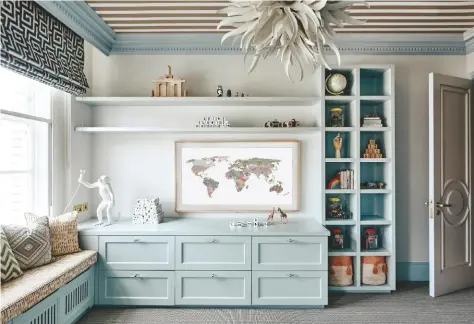  ??  ?? TOP Bespoke joinery is the best solution for storage because it can be designed to suit the occupants and the shape of the room. Part of the unit conceals the equipment for the wall-hung TV, which is disguised as a framed map