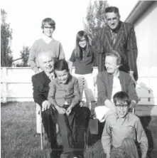  ??  ?? John and Olive Diefenbake­r with the Hughes family in their backyard on Kirk Crescent in Saskatoon in 1969.