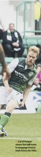  ??  ?? 2 Daryl Horgan steers the ball home in stoppage time to seal victory for Hibs.