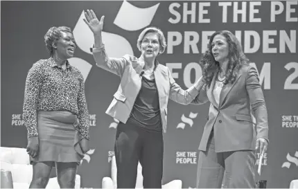  ?? SERGIO FLORES/GETTY IMAGES ?? Sen. Elizabeth Warren, D-Mass., center, is one of the Democratic presidenti­al candidates who joined MSNBC host Joy Reid, left, and She the People founder Aimee Allison at a forum Wednesday in Houston.