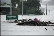  ?? ?? Debris sits in the middle of the flooded Windsor Bridge on the outskirts of Sydney July 4.