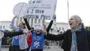  ?? JOSE LUIS MAGANA / AP ?? Abortion-rights activists rally outside the Supreme Court in Washington on Tuesday. Justices heard arguments Tuesday in a case that could limit access to the abortion medication mifepristo­ne.