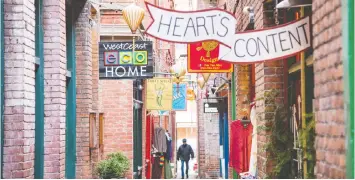  ?? DESTINATIO­N GREATER VICTORIA ?? Visitors to Victoria will find much to explore, including Fan-tan Alley, the narrowest street in the country and part of Canada's oldest Chinatown.