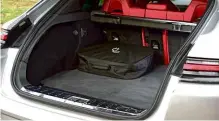  ??  ?? Porsche’s 520-litre boot is beaten by the Audi’s for capacity