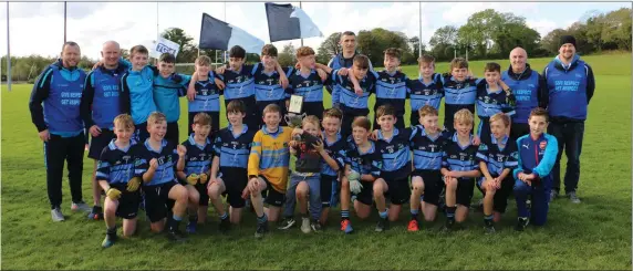 ??  ?? The An Tochar under-13 football team and mentors after their victory over Éire Óg Greystones in the ‘A’ county final in Ballinakil­l last weekend.
