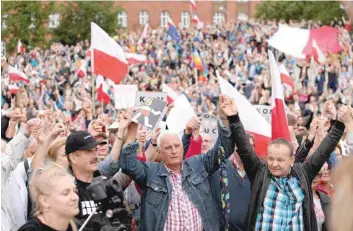  ?? — Reuters ?? People attend a protest against judicial reforms in Szczecin, Poland, on Thursday.