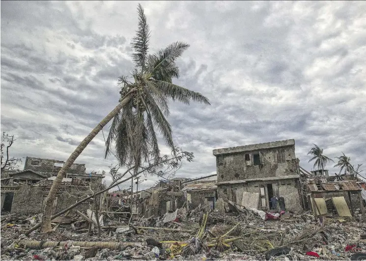  ?? LOGAN ABASSI / AFP / GETTY IMAGES ?? While Port-au-Prince was mostly spared from the full strength of Hurricane Matthew, towns like Jeremie, pictured, on the western tip of Haiti, were devastated by the storm.