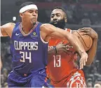  ?? ROBERT HANASHIRO/USA TODAY SPORTS ?? Rockets guard James Harden, colliding with Clippers forward Tobias Harris, says Houston’s success has made the team a target.
