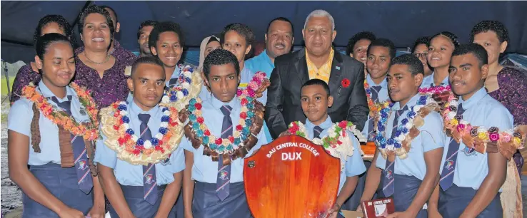  ?? Photo: Ronald Kumar ?? First Bau Central College 2018 Prize Giving ceremony award recipients and teachers with Prime Minister Voreqe Bainimaram­a , who also officially opened the new College building at Mokani, Bau, Tailevu, on October 17, 2018.