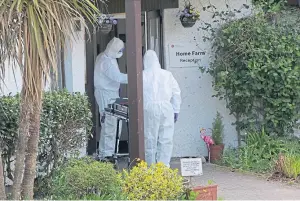  ?? Picture: Shuttersto­ck. ?? Funeral directors retrieve a body from the home.