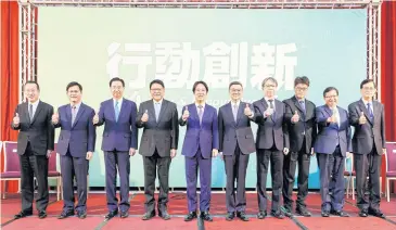  ?? AFP ?? Taiwan’s president-elect Lai Ching-te, centre, posing with his new cabinet in Taipei, Taiwan, yesterday.