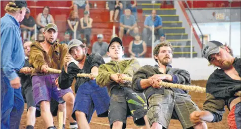  ?? COLIN CHISHOLM ?? In the men’s finals, the Falmouth team digs in, but the Antigonish team takes it in the end.