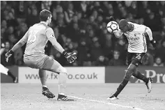  ?? — Reuters photo ?? Watford’s Abdoulaye Doucoure scores their second goal against Southampto­n at Vicarage Road in Watford.