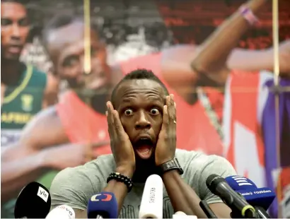  ?? — AP ?? Jamaica’s sprinter Usain Bolt grimaces during a Press conference in Ostrava, Czech Republic, on Monday.