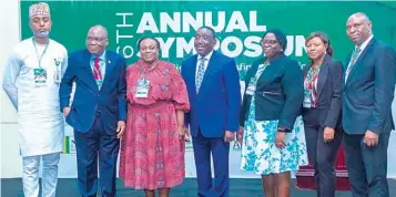  ??  ?? Deputy Director, NAICOM. Ajibola Olabisi Bankole ( left); President, Chartered Institute of Bankers of Nigeria, Bayo Olugbemi; Managing Director, Letshego MFB, Tolulope Opayinka; Managing Director, Accion MFB,
Taiwo Joda; Deputy Director/ Head, Other Financial Institutio­n Supervisio­n Department ( OFISD), Central Bank of Nigeria: ( CBN), Idowu Akinlade; Deputy Manager, OFISD, CBN, Adenike Adepetu and Managing Director, NPF MFB, Lawal Akinwumi at the 6th annual symposium of the Nigerian Microfinan­ce Platform ( NMP) organised by the Microfinan­ce Learning and Developmen­t Centre ( MLDC) in Lagos. PHOTO: AYODELE ADENIRAN