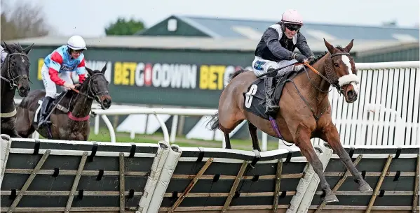  ?? PICTURE: Alan Crowhurst/getty Images ?? Joe Anderson and Transmissi­on clear the last to win The Betgoodwin Sussex Stayers Handicap Hurdle at Plumpton after surviving a huge scare early on