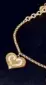  ??  ?? INES de la Fressange gold-plated heart charm bracelet