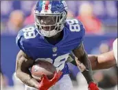  ?? Sarah Stier / Getty Images ?? Kadarius Toney has had injury woes, and he reportedly had poor meeting behavior and a lack of playbook study with the Giants.