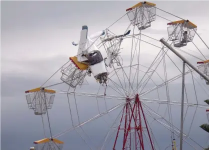  ?? Photograph: Frank Palfreyman/AAP ?? The light plane that crashed into a ferris wheel at a fair at Old Bar Beach near Taree in 2011. Amber Christine Arndell, who was on the ride, has been awarded her $1.5m in damages.