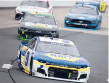  ?? JARED C. TILTON/GETTY ?? On Sunday, Chase Elliott, front, is going for his third straight win at Watkins Glen Internatio­nal, something only Mark Martin and Jeff Gordon have done.