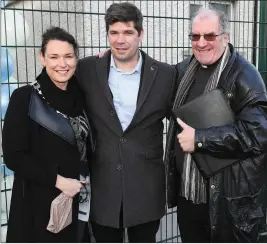  ?? Photos by John Kelliher ?? Former Kerry manager and current Pobalscoil Chorca Dhuibhne Príomhoide Éamonn Fitzmauric­e close to home on Friday to open the brand-new all-weather sports facility at Killocrim National School; pictured with his cousin, Listowel Municipal District Cathaoirle­ach Aoife Thornton; and Listowel Parish Priest Canon Declan O’Connor, who performed the blessing of the new facility - as officially opened by Éamonn, below.