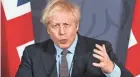  ?? GROVER/POOL/AFP VIA GETTY IMAGES PAUL ?? British Prime Minister Boris Johnson hailed the new agreement at a news conference Thursday in London.
