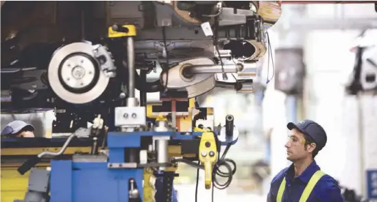  ?? Foto: CBN-Archiv ?? Arbeiter bei Ford in Valencia: Die Automobili­ndustrie in Spanien ist eine wichtige Stütze der Exportwirt­schaft.