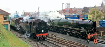  ??  ?? On one of its last workings before its boiler ticket expired, BR 4MT 2-6-4T No. 80104 leaves Swanage on May 10, passing newly-overhauled West Country No. 34028 Eddystone undergoing a boiler test. ANDREW PM WRIGHT