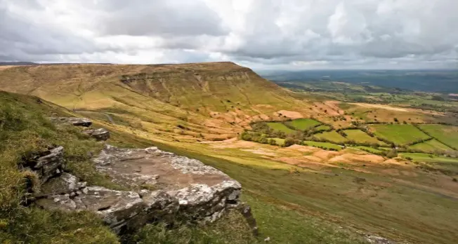  ??  ?? Twmpa, part of the great north-west escarpment of the Black Mountains, as seen from Hay Bluff, affords panoramic views over open countrysid­e.