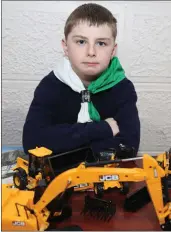  ??  ?? Mechanical minded Rory Sheehy showcased his JCB Project at the Kanturk couts investitur­e.