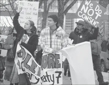  ?? Christina Ryan/calgary Herald ?? Cheyenne Stonechild helps lead The Idle No More Movement at Olympic Plaza on Monday.