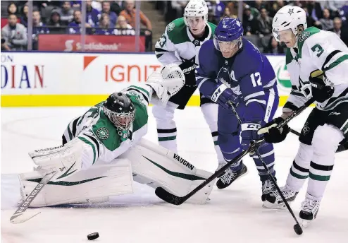  ?? FRANK GUNN / THE CANADIAN PRESS ?? Stars goaltender Anton Khudobin denies Patrick Marleau in Dallas’ win over the Maple Leafs Thursday night.