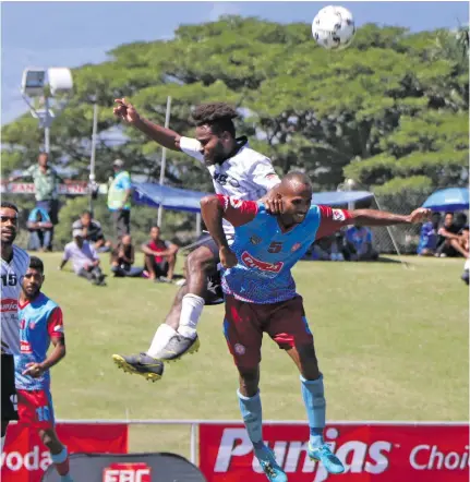  ?? Photo: Fiji FA Media ?? Nasinu midfielder Nasoni Mereke in an aerial battle against Suva’s Patrick Taroga during the Punjas Battle of the Giants tournament at Churchill Park, Lautoka on August 8, 2020.