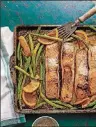  ?? CONTRIBUTE­D BY ALISON MIKSCH ?? Saturday’s Honey-Soy Glazed Salmon With Veggies and Oranges is also served with brown rice and broccoli.