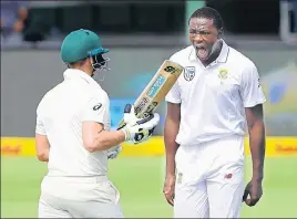  ?? REUTERS ?? ■ South Africa pacer Kagiso Rabada exults after taking the wicket of Australia captain Steve Smith on the first day of the second Test in Port Elizabeth on Friday.