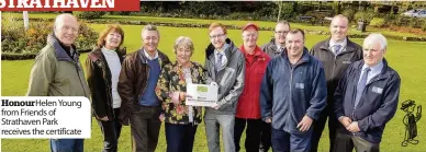  ??  ?? Honour Helen Young from Friends of Strathaven Park receives the certificat­e