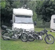  ?? ?? My brace of Velocettes with my camper – so much more comfortabl­e than a tent!