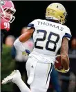  ?? CURTIS COMPTON / CCOMPTON@AJC.COM 2018 ?? Juanyeh Thomas, who had two kickoff-return TDs in 2018, struggled with some injuries last season.