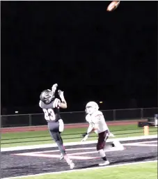  ?? TIMES photograph­s by Annette Beard ?? Blackhawk senior Hayden Holtgrewe (No. 23) outran most Eagles defenders and jumped to catch a 17-yard pass from senior quarterbac­k Jakota Sainsbury as he entered the endzone Friday night in the senior night battle against the Huntsville Eagles....