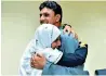  ??  ?? TEARS OF JOY: Tahir Ayoub with his mother at Dubai airport