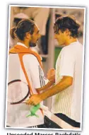  ??  ?? Unseeded Marcos Baghdatis (left) after his 2006 final defeat by Roger Federer.