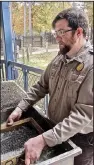  ?? Special to the Democrat-Gazette/ MARCIA SCHNEDLER ?? Interprete­r Waymon Cox
shows Crater of Diamonds State Park visitors how to hunt for the gems by doing wet sifting.