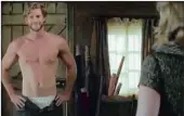  ??  ?? HUNK: Liam Hemsworth and Kate Winslet in The Dressmaker.