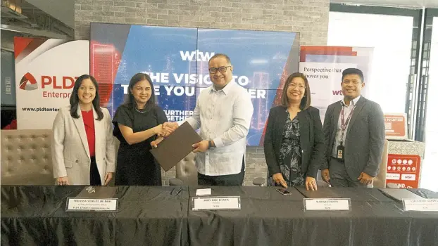  ?? ?? Present during the signing are, from left, PLDT Vice President and Enterprise Revenue Group Head Jecyn Chua-Teng, PLDT and Smart Chief Sustainabi­lity Officer Melissa Vergel De Dios, WTW President John Eric Ramos, WTW HR Director Mariquit Sison, and WTW Associate Director for RE&WS Facilities Services Valentino Cagsawa.