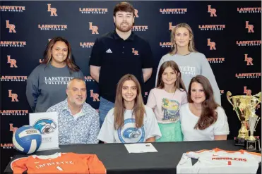  ?? Chris O’Neil ?? Recent LaFayette graduate Caitlyn Lambitz will be continuing her volleyball career at nearby Shorter University after signing with the NCAA Division II school this past Wednesday. Also on hand for the ceremony was Greg, Sophia and Crystal Lambitz, along with LaFayette assistant coach Timerra Kingsley, LaFayette head coach Chris Logan and LaFayette assistant coach Catherine McConnell.