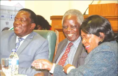  ??  ?? Acting President Emmerson Mnangagwa (left) shares a lighter moment with Senate President Edna Madzongwe (right) and moderator Simbi Mubako during a Parliament Open Day Symposium in Harare yesterday. — (Picture by Justin Mutenda)