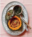  ?? ?? ‘Stews welcome grains, particular­ly pearl barley’: Thomasina Miers’ whole roast pumpkin with herby pearl barley, chestnut, gorgonzola, garlic and chilli. Photograph: Yuki Sugiura/The Guardian. Food styling: Aya Nishimura. Prop styling: Louie Waller. Food assistant: Hanna Miller