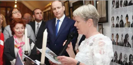  ?? Pics: ?? Constance Cassidy gives a rousing speech calling for equal pay and political representa­tion for women at opening of ‘The Voice of Women’ exhibition at Lissadell as Fianna Fáil leader Micheál Martin and Deputy Marc MacSharry look on. Carl Brennan.